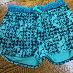 Under Armour athletic shorts.  Juniors size XL.  Teal and blue.  Good condition
